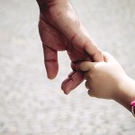 Hands: dad and daughter